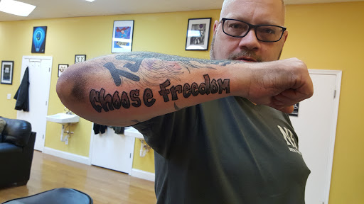 Explore bicep tattoo ideas, creative tattoo ideas in Edison, available at Tattoo Asylum