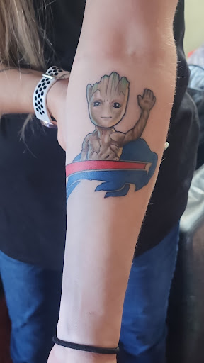 Explore wu tang tattoo ideas, creative tattoo ideas in Homer, available at Mostly Harmless Tattoo Studio