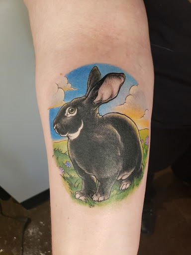 Find cloud tattoo ideas for your next unique tattoo in Minneapolis at Peregrine Tattoo