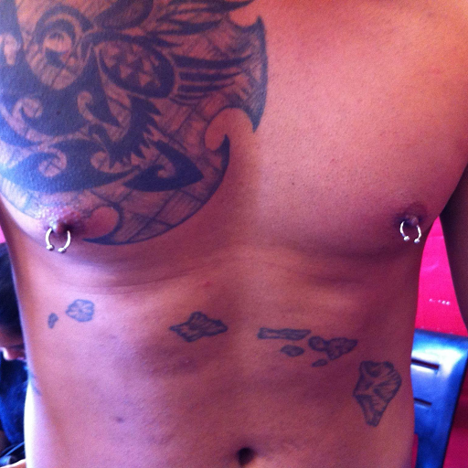 Explore tattoo ideas for mens, creative tattoo ideas in Logan, available at COLLECTIVE STUDIO HOUSE OF MANA INK
