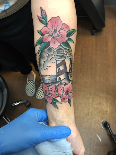 Explore solid black tattoo ideas, creative tattoo ideas in Lodi, available at Emerald Tattoo & Piercing - Lodi