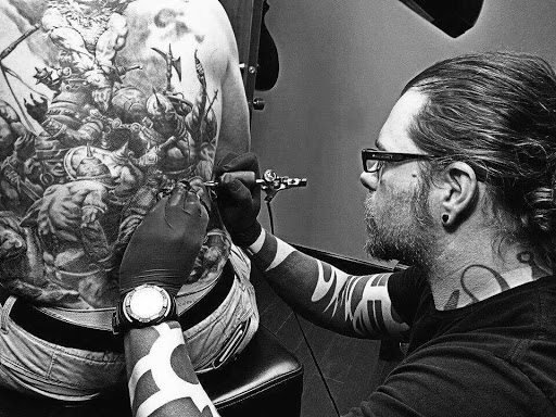 Explore medium sized tattoo ideas, creative tattoo ideas in Addison, available at Cat Tattoo