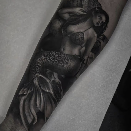 Explore woman sleeve tattoo ideas, creative tattoo ideas in Valdosta, available at Acid Ink Tattoos