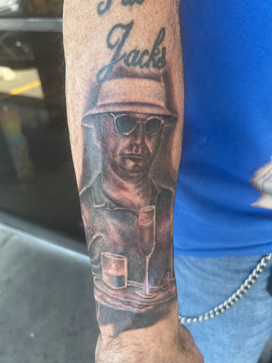 Explore tattoo filler ideas for men, creative tattoo ideas in Las Vegas, available at Work of Art Tattoo and Piercing