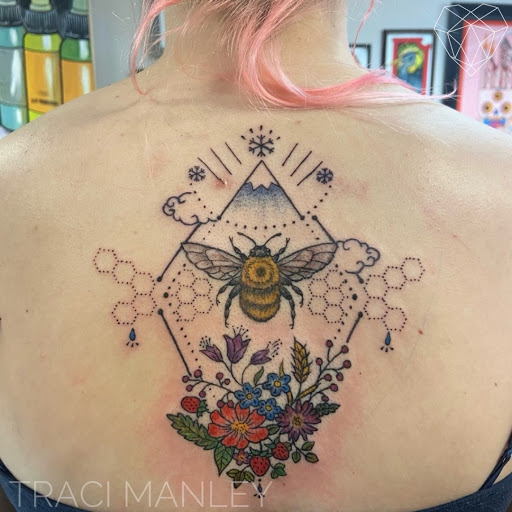 Find between the boob tattoo ideas for your next unique tattoo in Spokane at Moms Custom Tattoo & Body Piercing