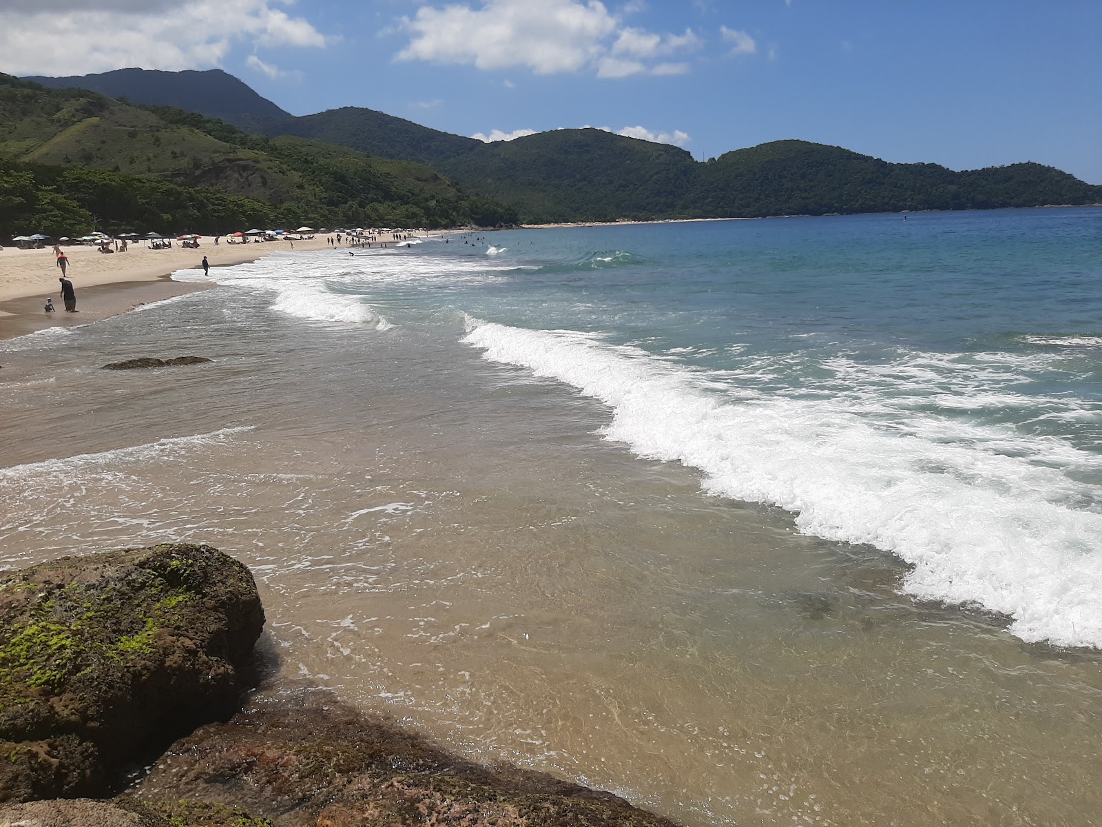 Foto af Santiago Strand med turkis rent vand overflade