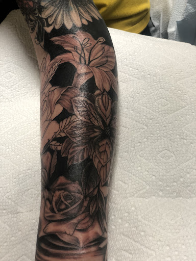 Explore name tattoo ideas on arm, creative tattoo ideas in Spokane, available at Platinum Rose Tattoo Studio