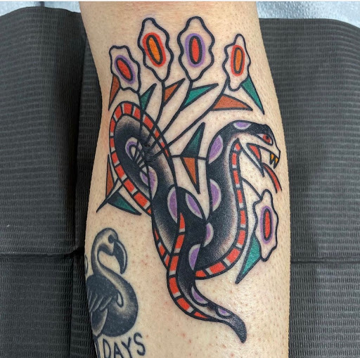 Explore spine tattoo ideas for men, creative tattoo ideas in Portland, available at Lombard Street Tattoo