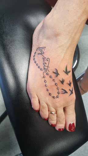 Find angels tattoos ideas for your next unique tattoo in Chicago at THE TAT CAVE
