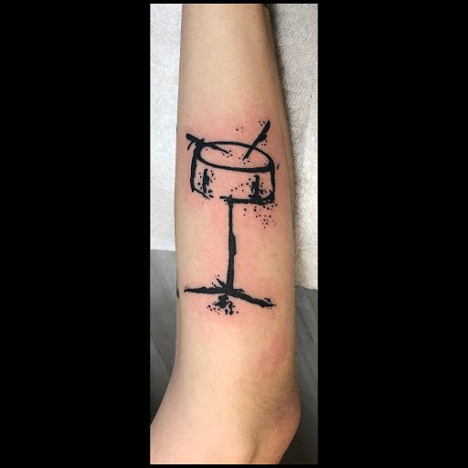 Explore lost time tattoo ideas, creative tattoo ideas in Londonderry, available at Billy Goat Tattoo