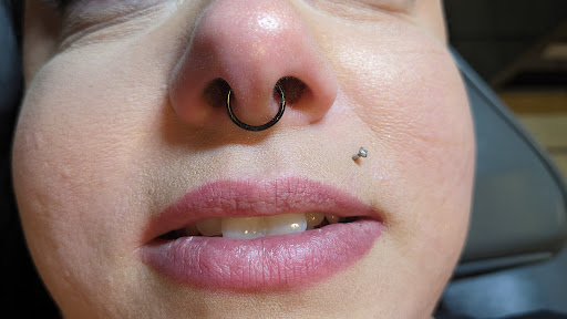 Explore latitude longitude tattoo ideas, creative tattoo ideas in Minocqua, available at Lotus Piercing