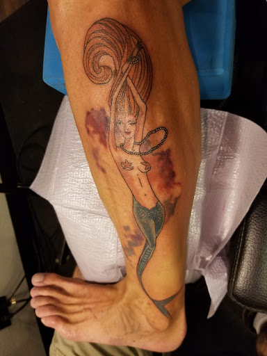 Explore motocross tattoo ideas, creative tattoo ideas in Carson City, available at Hooligans Ink