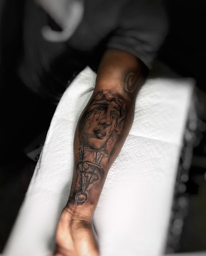 Explore simple outline tattoo ideas, creative tattoo ideas in Lavonia, available at 1890 Tattoo Co.