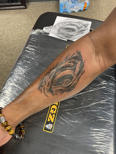 Explore side of head tattoo ideas, creative tattoo ideas in Waldorf, available at Hypnotique Ink