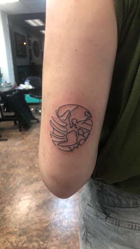 Explore emerald tattoo ideas, creative tattoo ideas in Lufkin, available at Blue Lotus Tattoo & Piercing