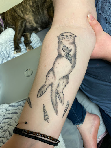 Explore paintbrush tattoo ideas, creative tattoo ideas in Duluth, available at Anchors End Tattoo