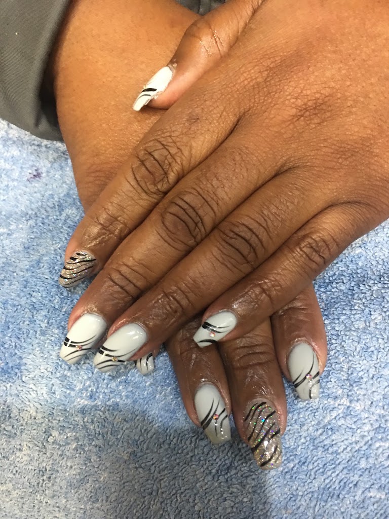 L J Nails 77545