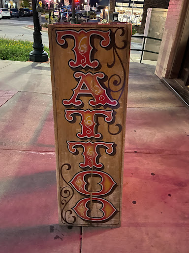 Explore mickey tattoo ideas, creative tattoo ideas in Denton, available at Dark Age Tattoo Studio