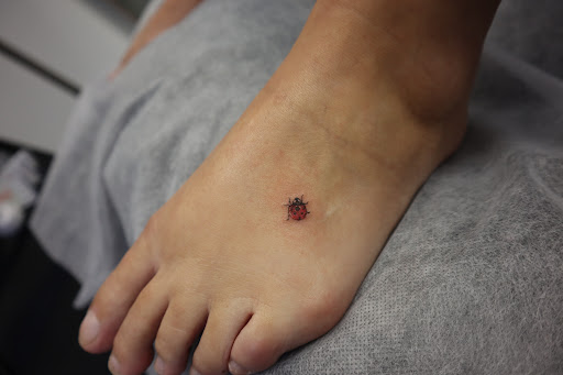 Explore tattoo ideas polynesian, creative tattoo ideas in Orange, available at Baron Art Tattoo