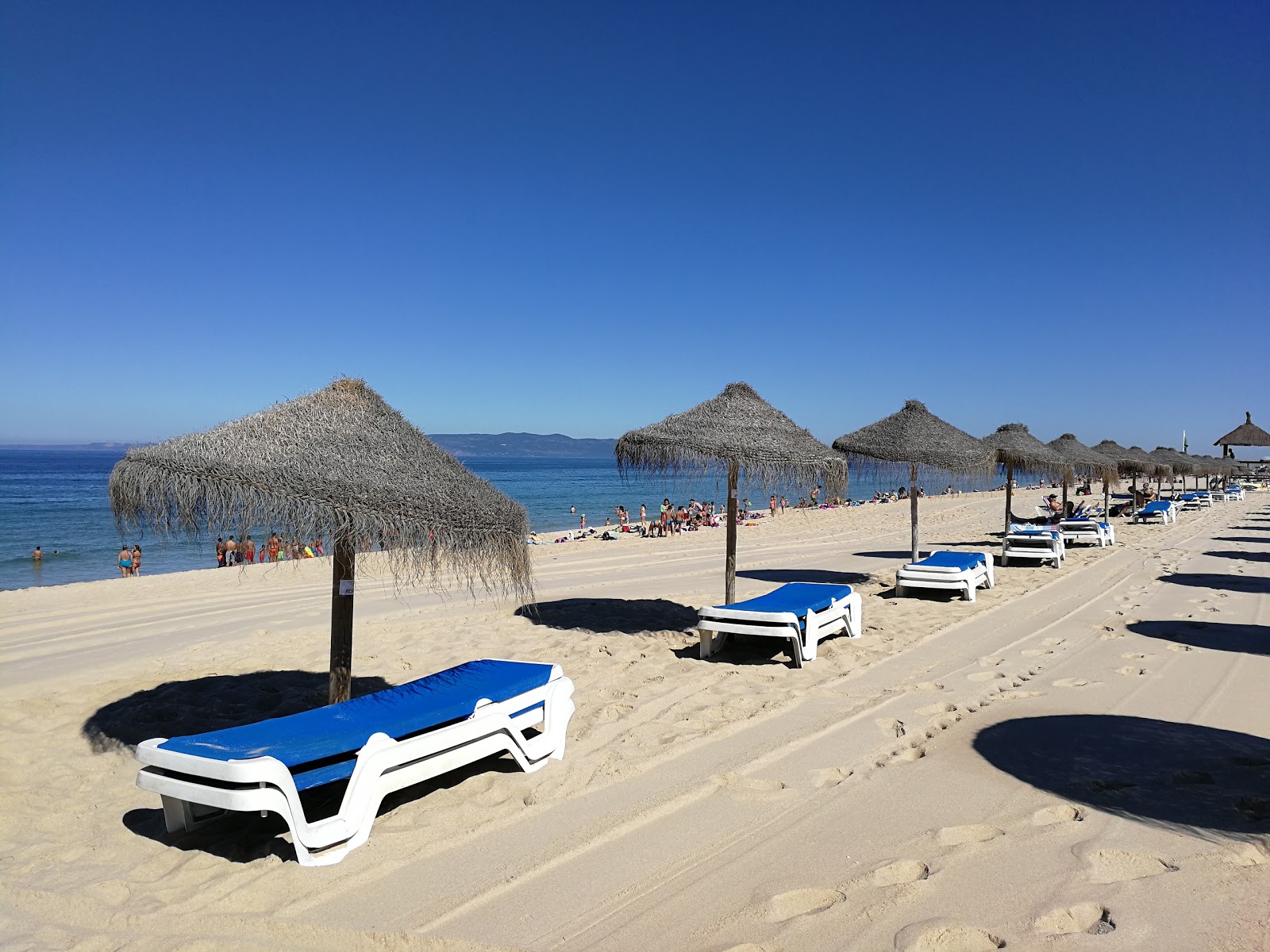 Comporta Plajı'in fotoğrafı - rahatlamayı sevenler arasında popüler bir yer