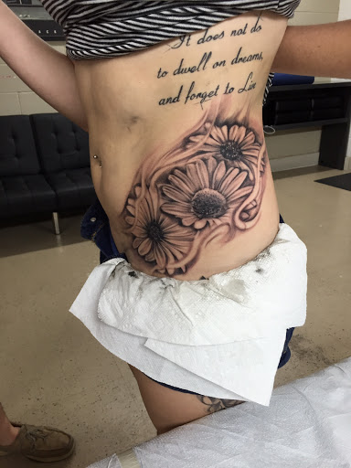 Explore rockstar tattoo ideas, creative tattoo ideas in Lawton, available at Avenue Tattoo Studio