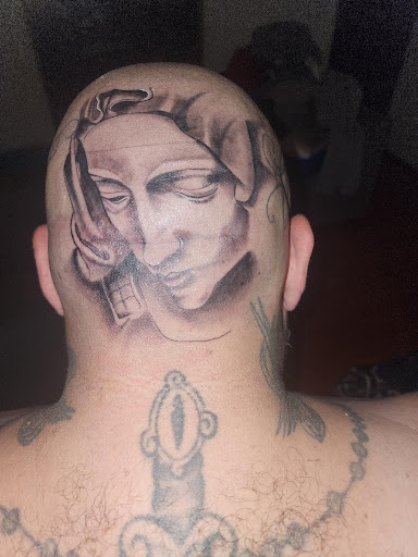 Explore music tattoo ideas men, creative tattoo ideas in Orange, available at Ink Activitiez Tattoo