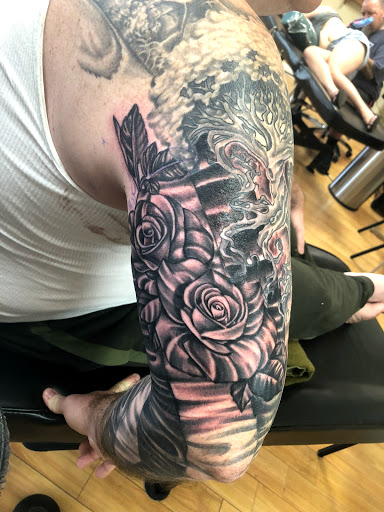Explore butterfly back tattoo ideas, creative tattoo ideas in Liberty, available at Dark Lotus Tattoo & Salon