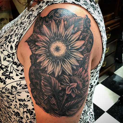 Explore breast cancer awareness tattoo ideas, creative tattoo ideas in Black River Falls, available at Black River Tattoo