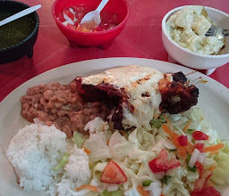 Pollos y carnes asadas photo