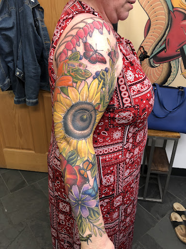 Explore lighthouse tattoo ideas, creative tattoo ideas in Menomonie, available at Kindhand Tattoo