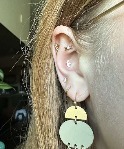 Find under the breast tattoo ideas for your next unique tattoo in Aberdeen at The Wilder Studio - Piercing & Jewelry