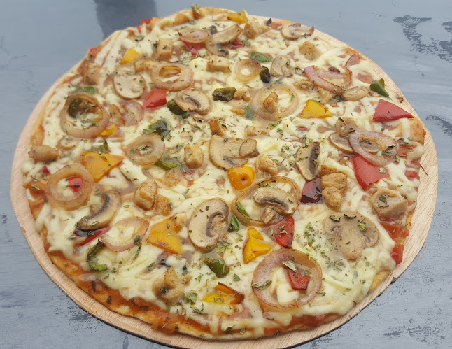 Opiniones de Peggi's Pizza en Puerto Lopez - Restaurante