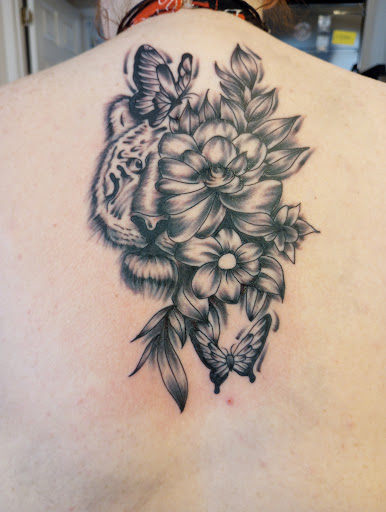 Explore outside arm tattoo ideas, creative tattoo ideas in Hanceville, available at Wildman Tattoo and Body Piercing