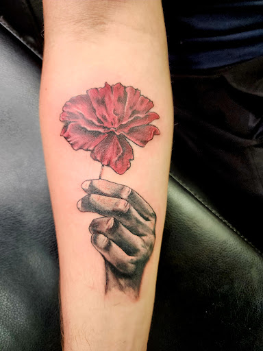 Explore radiohead tattoo ideas, creative tattoo ideas in West Bend, available at Frenchys Tattoos & Co LLC
