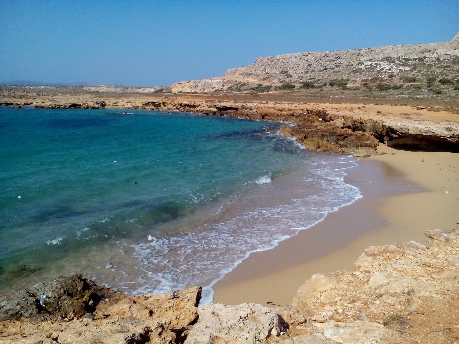 Foto von Exo Elaris beach mit türkisfarbenes wasser Oberfläche