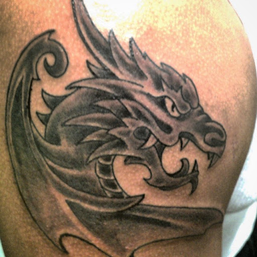 Explore america tattoo ideas, creative tattoo ideas in Bloomfield, available at Tattoo Garage