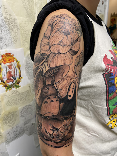 Find charm bracelet tattoo ideas for your next unique tattoo in Gloucester City at 12 oz. Studios Tattoos and Piercing Brooklawn