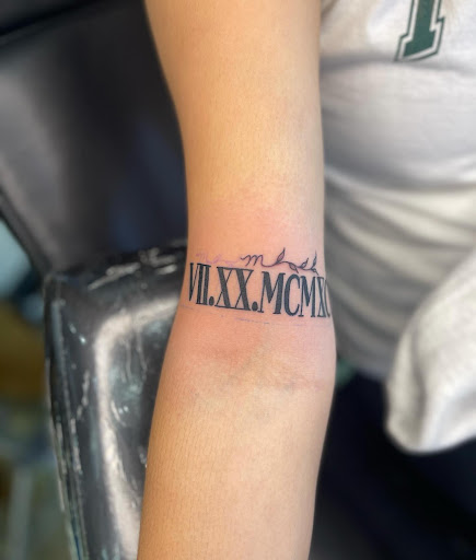 Explore wrestling tattoo ideas, creative tattoo ideas in Belgrade, available at The Loyal Sparrow Tattoo and Piercing