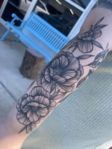 Explore lv tattoo ideas, creative tattoo ideas in Akron, available at Black Amethyst Tattoo Company Akron