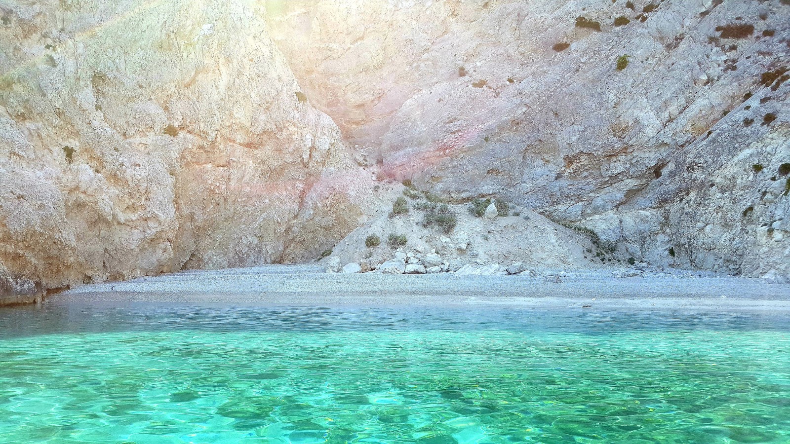 Foto af X-Beach med turkis rent vand overflade