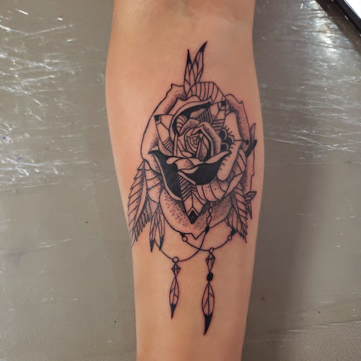 Explore cross forearm tattoo ideas, creative tattoo ideas in Houston, available at 247 TATTOOS AND PIERCINGS