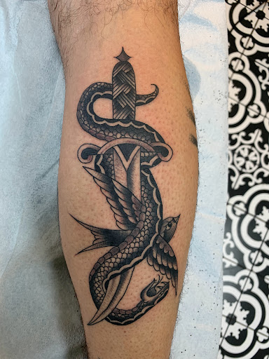 Explore son name tattoo ideas, creative tattoo ideas in Milwaukee, available at MANIA Tattoos Milwaukee