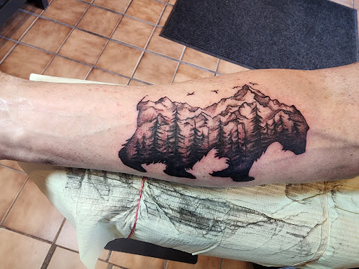 Explore sunflower arm tattoo ideas, creative tattoo ideas in Minocqua, available at Walking Arts Tattoos