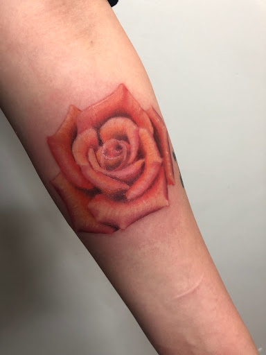 Explore cover up tattoo ideas female hand, creative tattoo ideas in Adrian, available at Ambition Ink