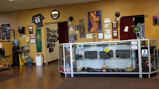 Explore woman face tattoo ideas, creative tattoo ideas in Mandan, available at Dolls Studios Tattoo & Piercing