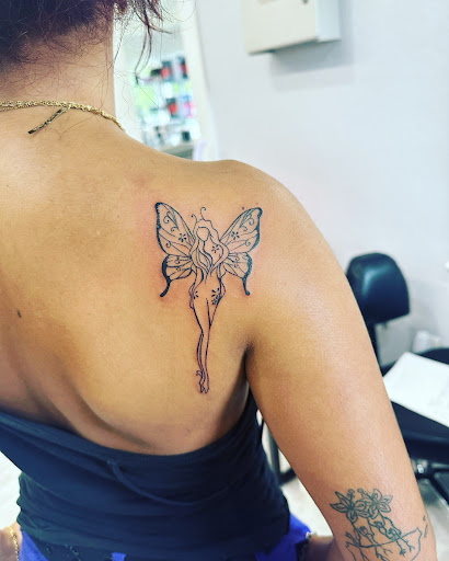 Explore tattoo sleeve filler ideas for a woman, creative tattoo ideas in Cocoa, available at Rorschach Tattoo Shop and Piercing Studio