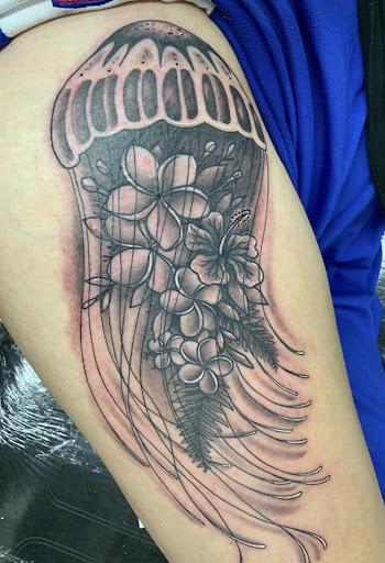 Explore barber pole tattoo ideas, creative tattoo ideas in Honolulu, available at Aloha Tattoo Waikiki Hilton Hawaiian Village Rainbow Bazaar