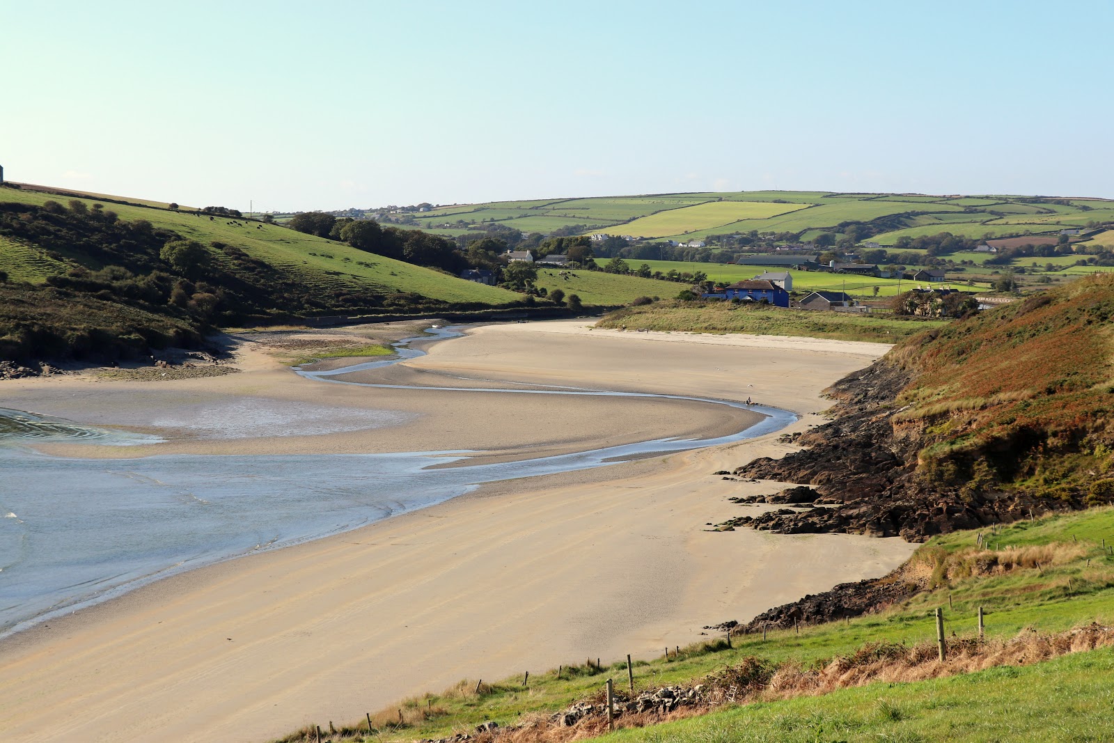 Foto de Moloney's Beach con arena beige superficie