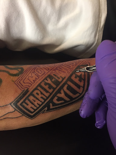 Explore 2 cat tattoo ideas, creative tattoo ideas in Lakeland, available at Lyons Den Tattoo Company