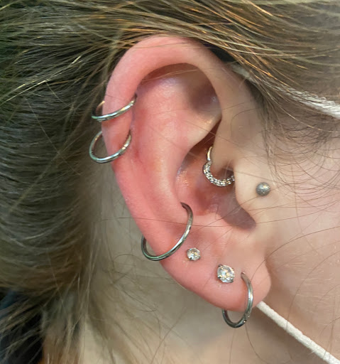 Explore tattoo ideas for lower abdomen, creative tattoo ideas in Rehoboth Beach, available at Homeward Tattoo and Body Piercing